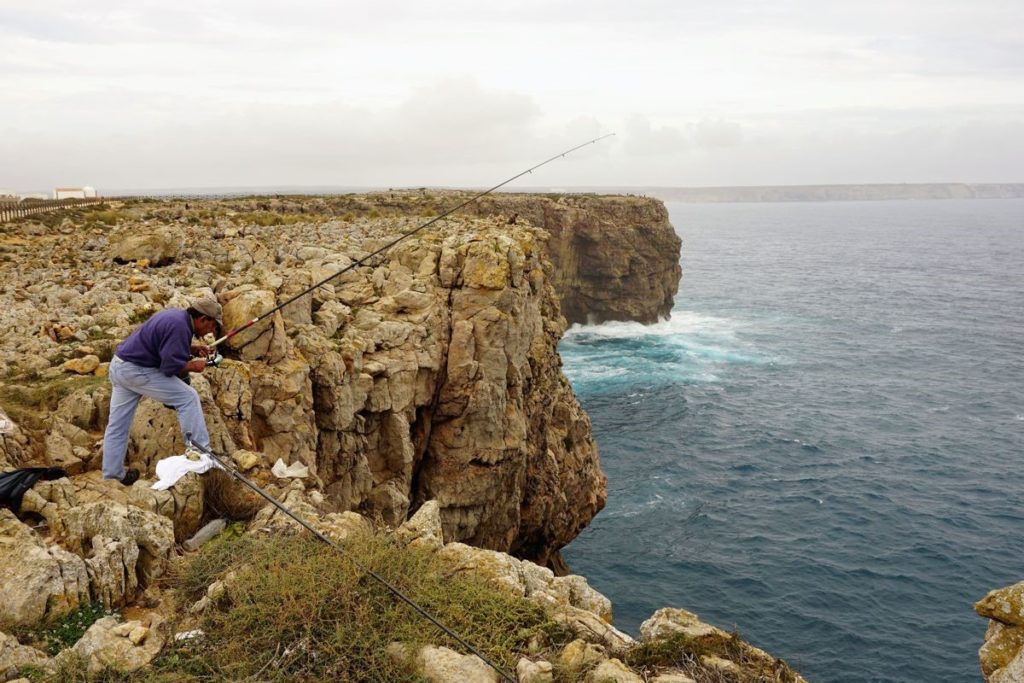 Fisherman on the rocks, in Sagres